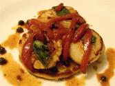 Scallops And Red Peppers Over Potato Pancakes